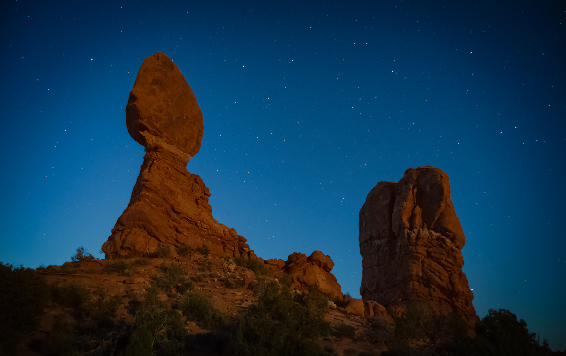 Balanced Rock under moonlit sky, Arches National Park, Moab Utah