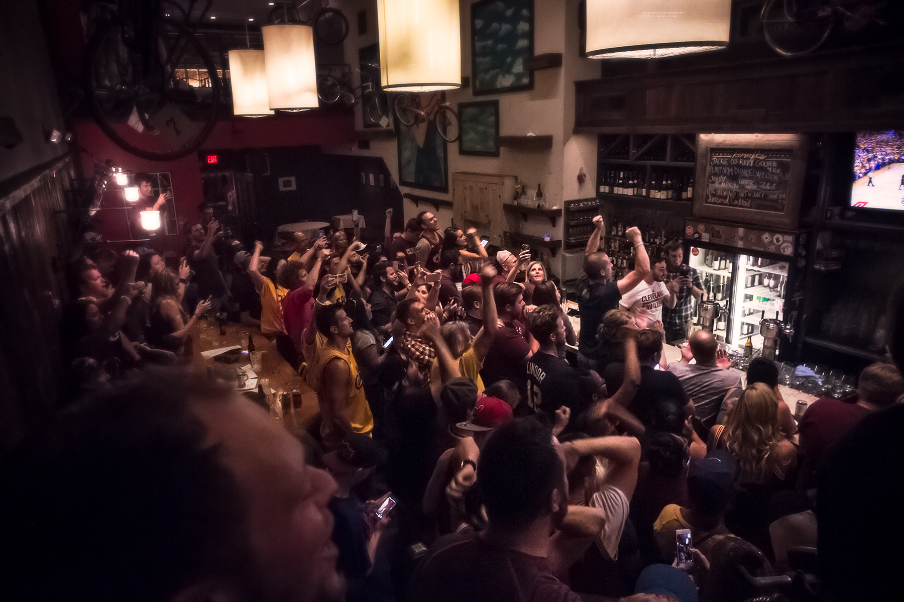 Bar erupts in celebration the moment the Cavaliers win the NBA Championship, Cleveland
