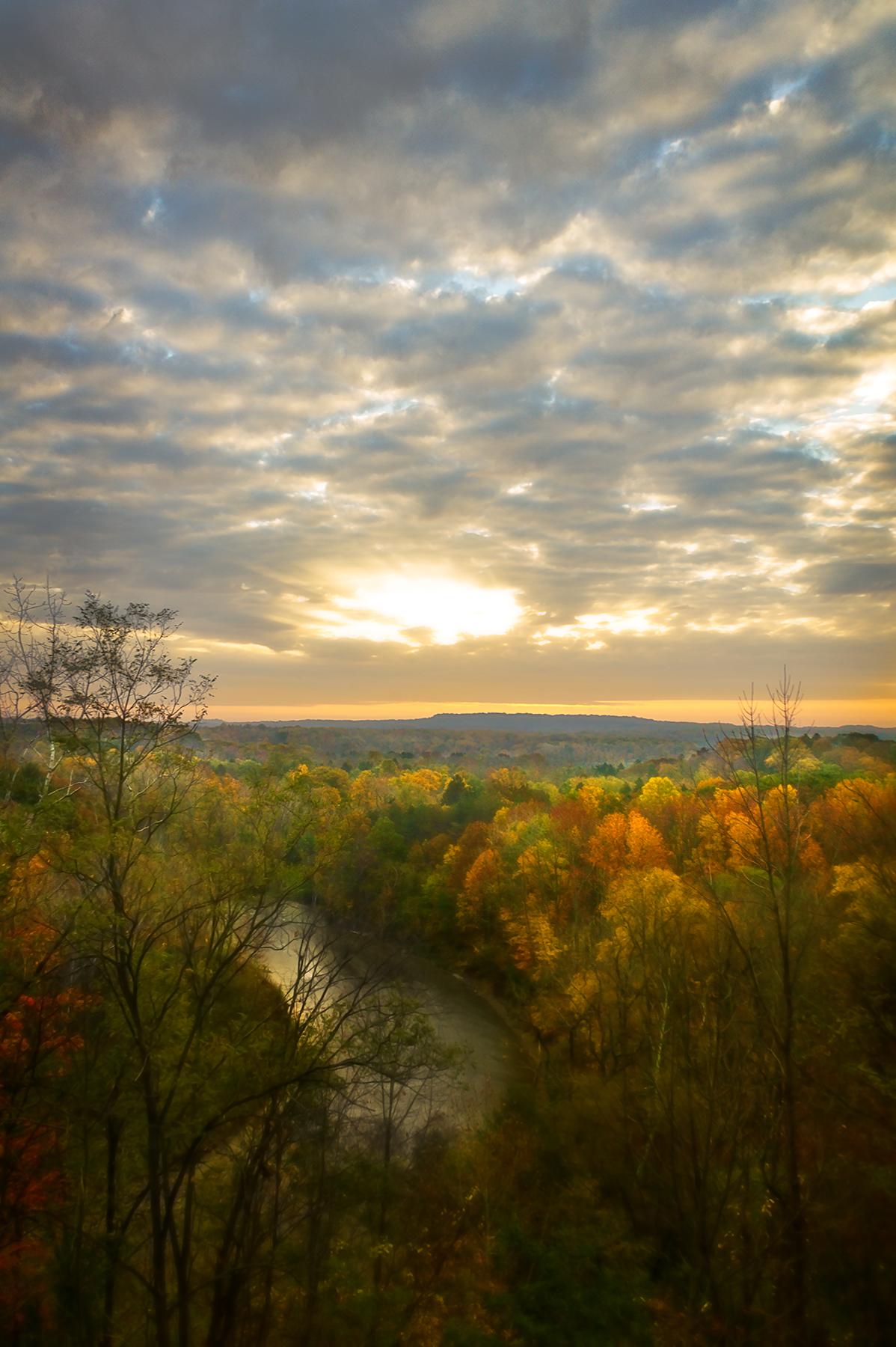 Chagrin River valley in fall color, dramatic breaking sky, Willoughby Ohio overlook